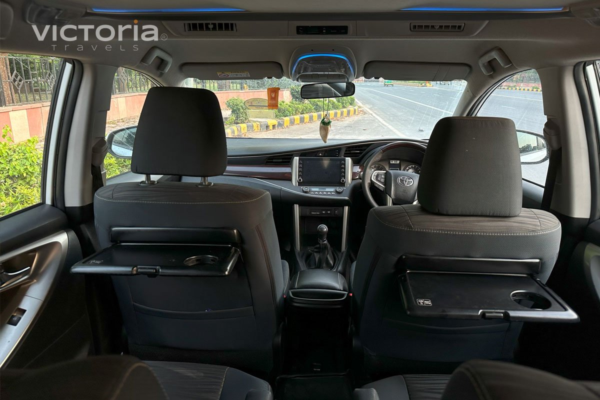 Black Kia Carnival Front Seat View